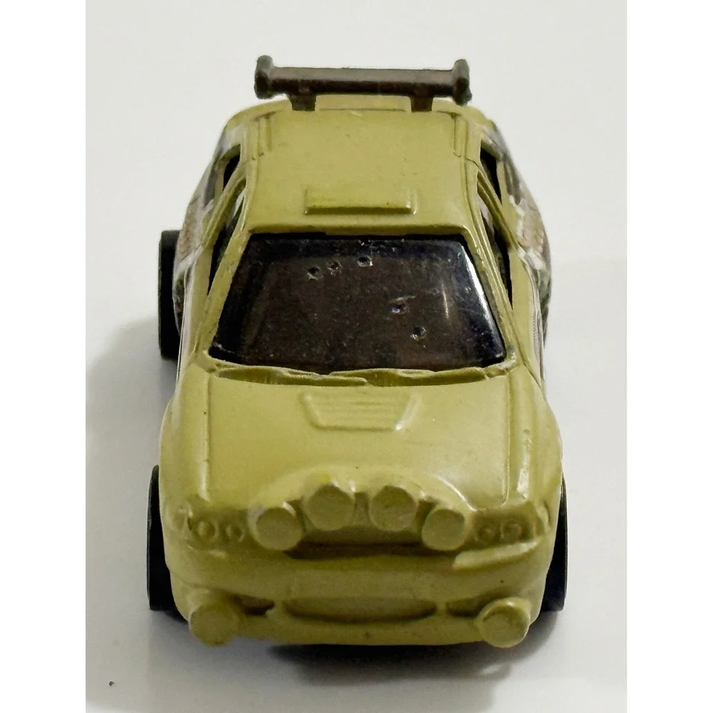Hot Wheels Escort Rally Kids 1/64 Tan Fossil Fueled T-Rex Dinosaur Car 1996